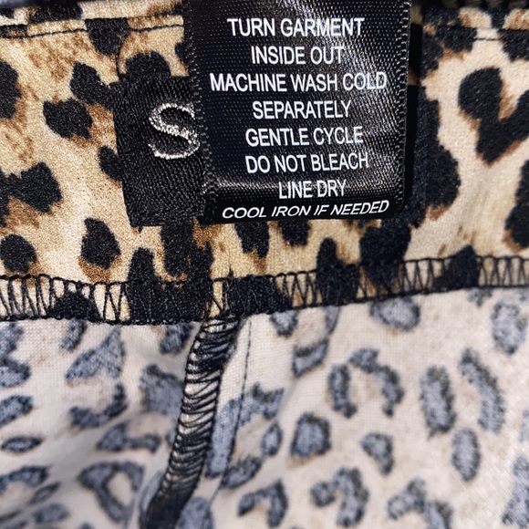 Soho cheetah print w/ asymmetrical faux buttoned hem line midi pencil skirt - Picture 7 of 7